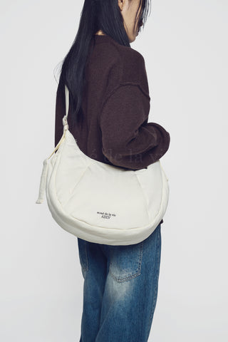 BASIC LOGO HIDDEN POCKET CROSS BAG IVORY