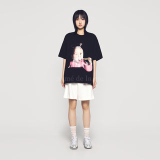 BRUSHING TEETH GIRL BABY FACE SHORT SLEEVE T-SHIRT (OVERSEAS EXCLUSIVE) BLACK