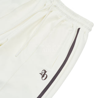 SYMBOL LOGO TRACK JERSEY PANTS CREAM