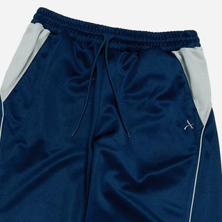 ONE POINT LOGO COLORING WIDE TRACK PANTS NAVY